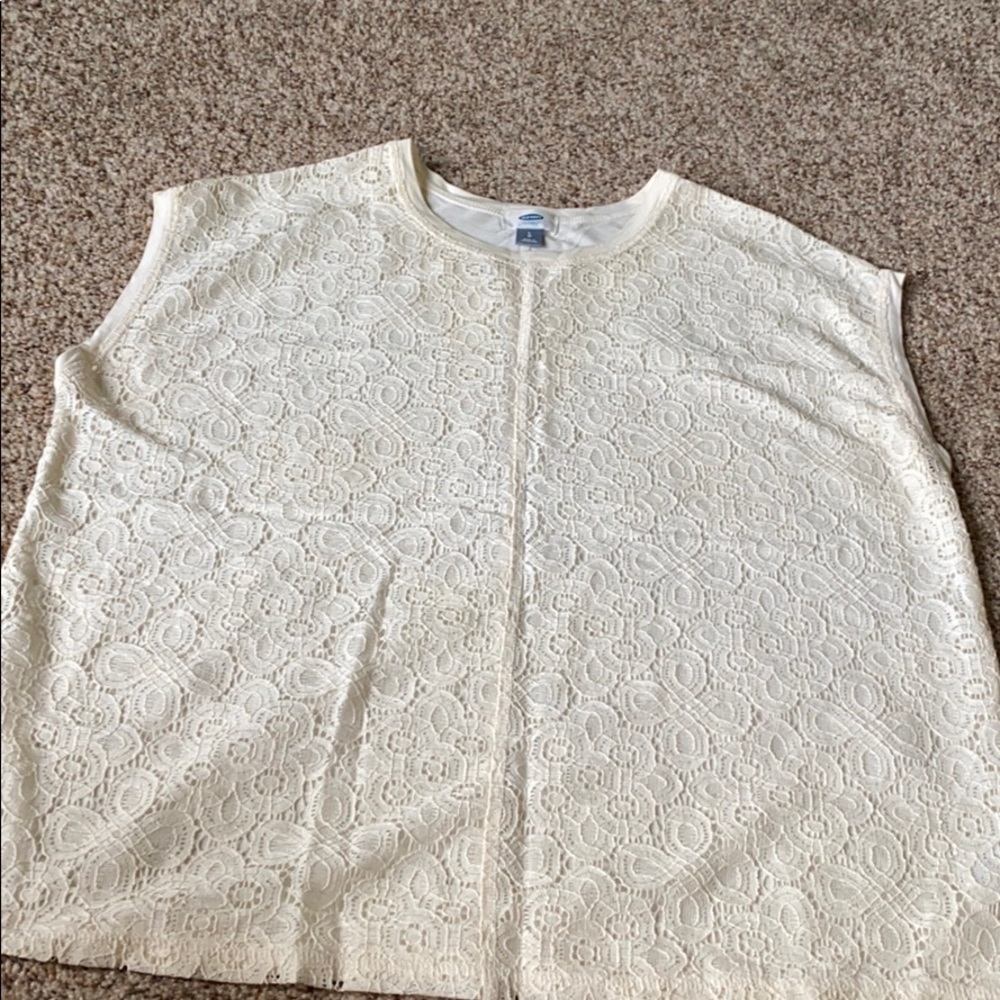 Cream lace front, sleeveless ladies shirt
